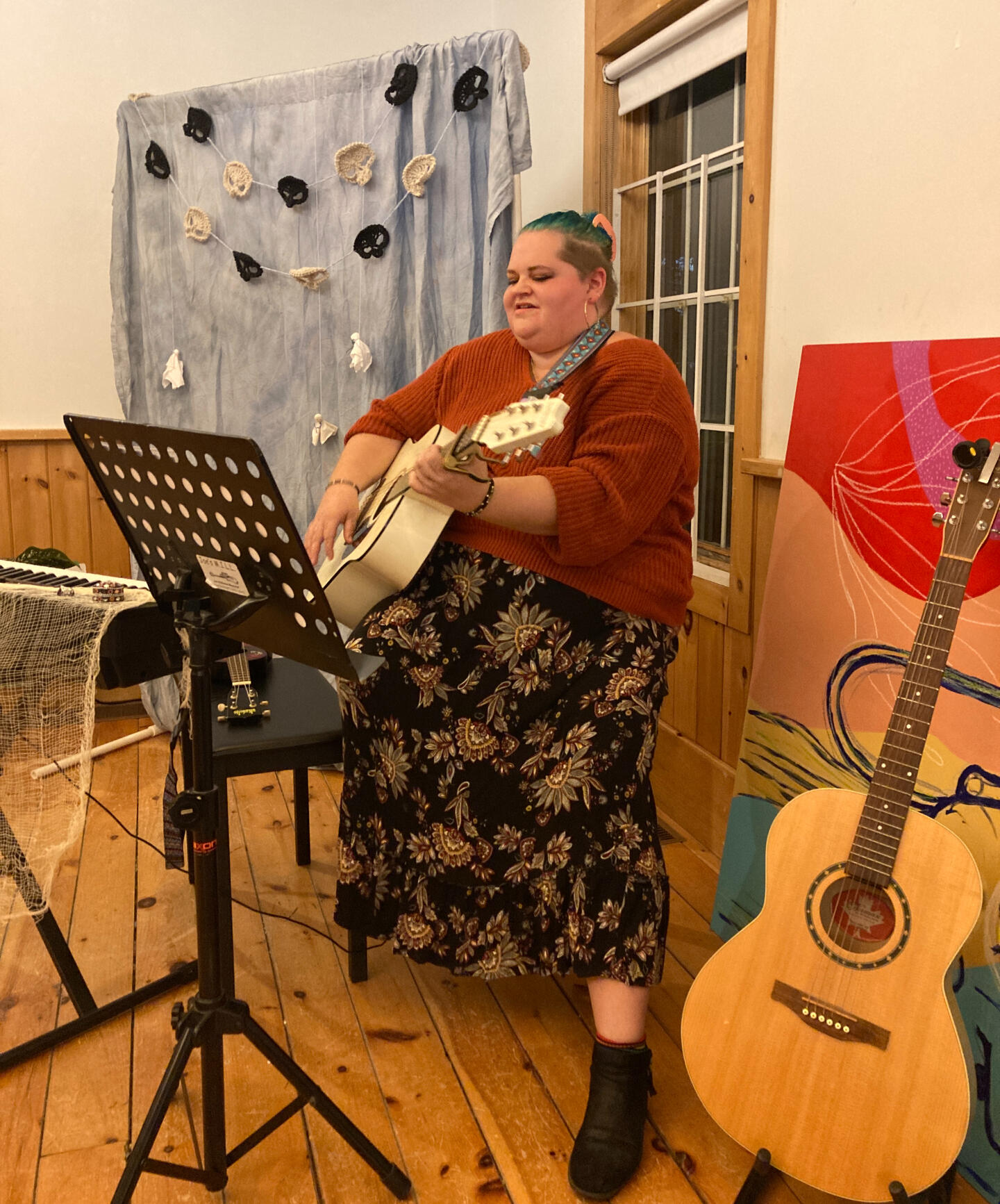 Performer playing guitar